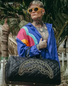 BORSA DA BORSONE NOIR TRAPUNTATA CON CATENA D’ORO E DETTAGLI A FORMA DI SQUALO