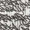 CAMICIA A MANICHE CORTE CON GRAFFITI E CHIUSURA A BOTTONI SUL DAVANTI