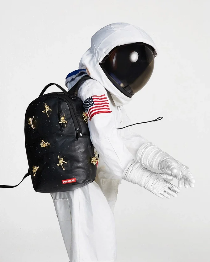 LO Zaino “LOST IN SPACE” (10 ASTRONAUTI IN METALLO DORATO 3D)