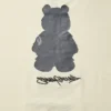MAGLIETTA A MANICHE CORTE CON STAMPA "MONEY BEAR" (ALBICOCCA)
