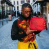 PORTAMERENDA IN MATTONI CON MOTIVO MONETE, ALIAS PORTADENARO
